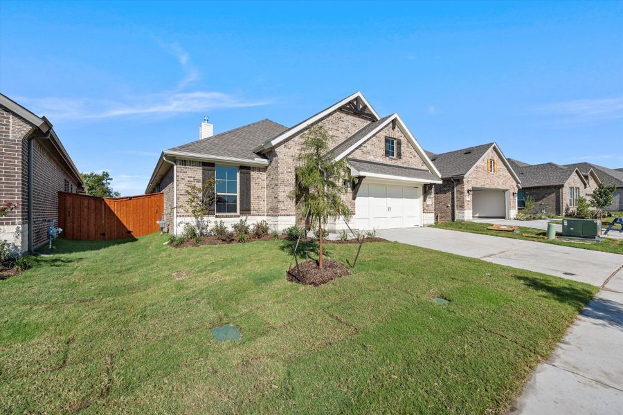 Front exterior of a new home in Morningstar, Aledo, TX, highlighting curb appeal (Image 26).