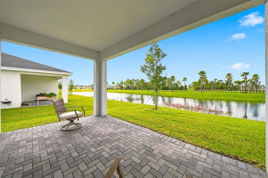 Exterior details and patio area of a home in The Timbers at Everlands, Palm Bay (Image 30).