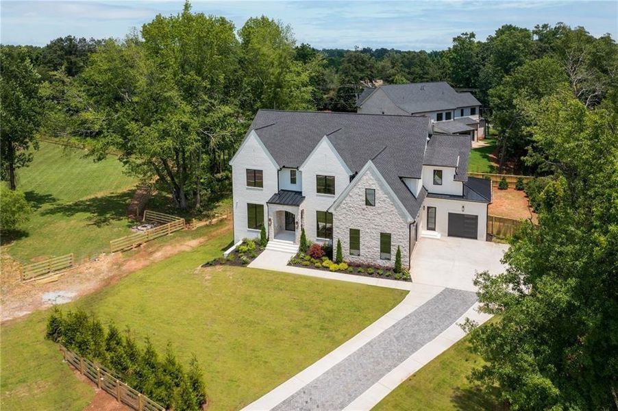 Front exterior of a new home in , Alpharetta, GA, highlighting curb appeal (Image 27).