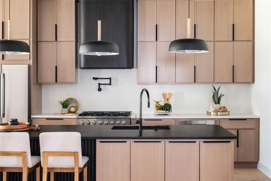 Slim shaker cabinets frame the open kitchen.