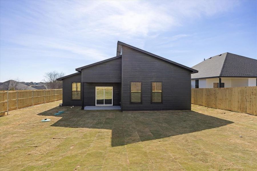 Exterior details and patio area of a home in , Granbury (Image 24).
