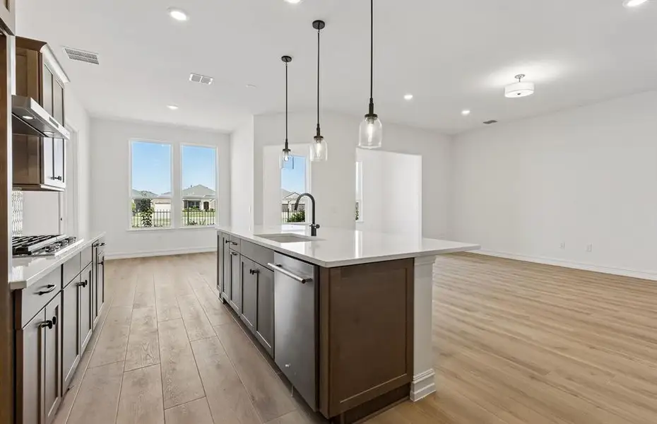 Large kitchen island overlooking main living areas