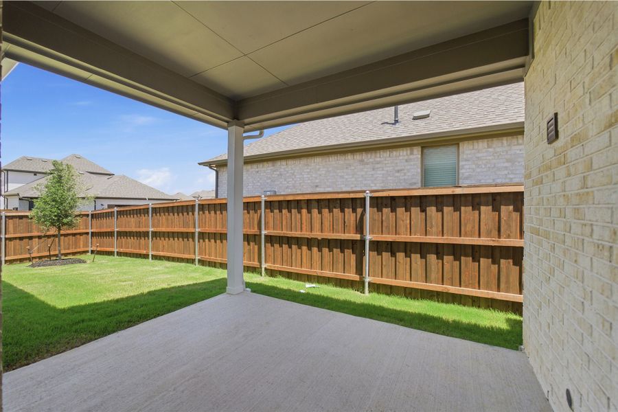 Exterior details and patio area of a home in La Terra, Celina (Image 4). Exterior details and patio area of a home in La Terra, Celina (Image 4).