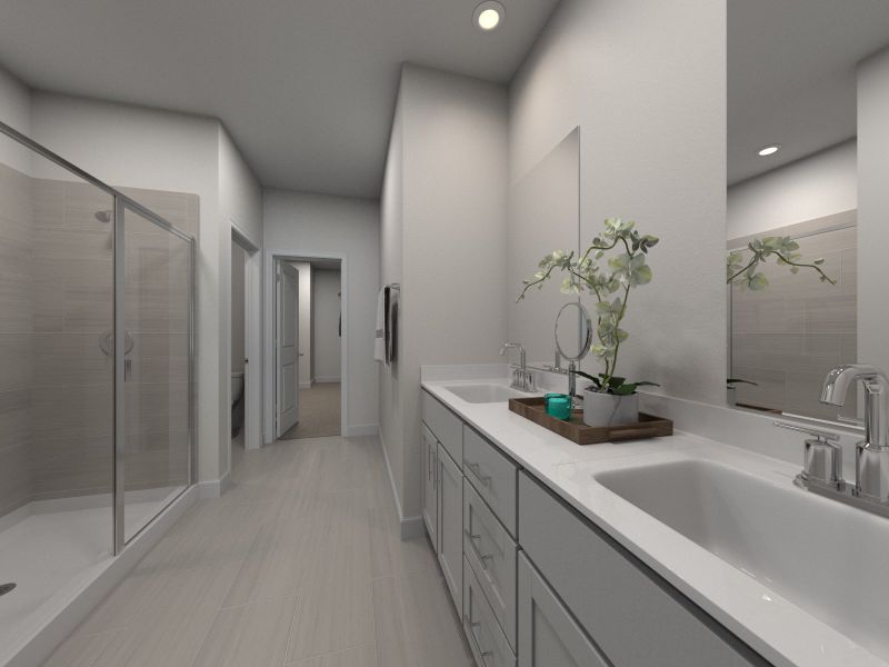 The primary bathroom offers dual vanity sinks and a walk-in shower.