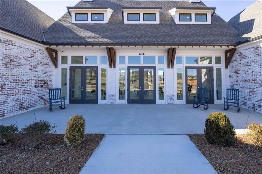 Exterior details and patio area of a home in Promenade at Sawnee Village, Cumming (Image 22).