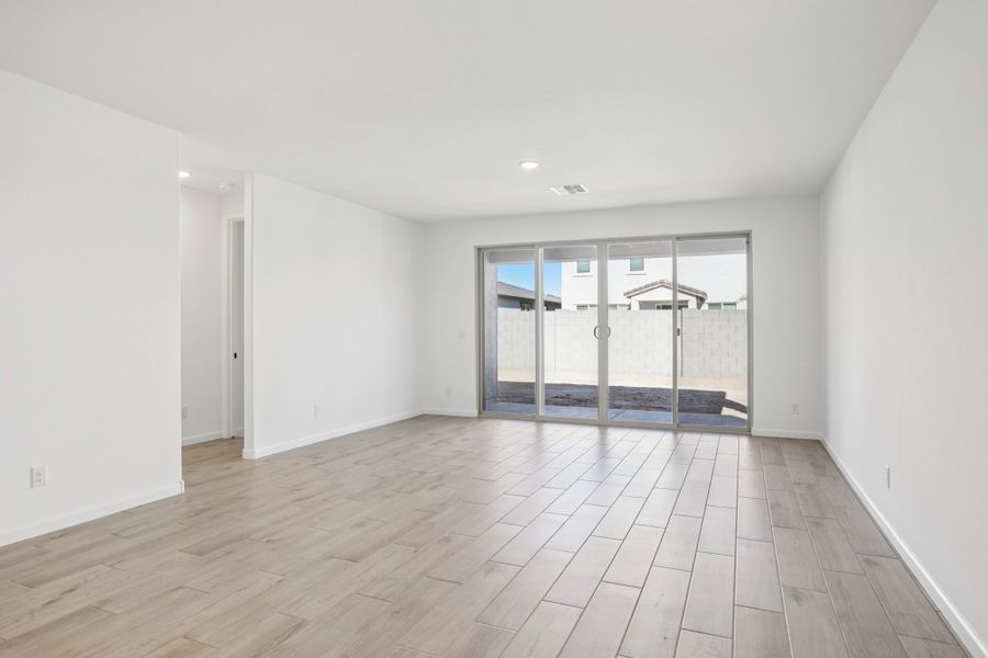 Great room. Finishes and options may vary by community