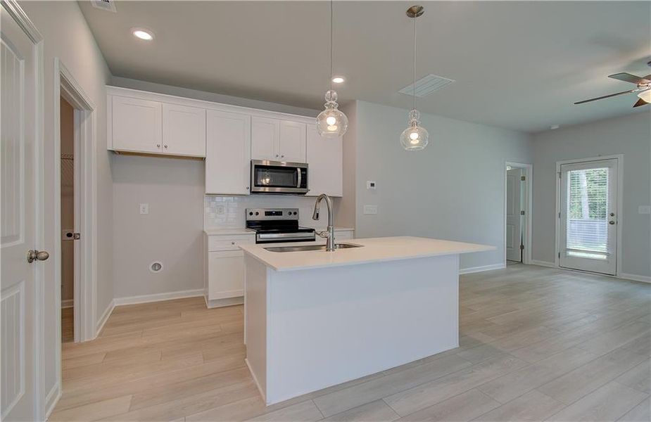 Furnished interior view inside a new home in Enclave at Evergreen, Fairburn (Image 6).