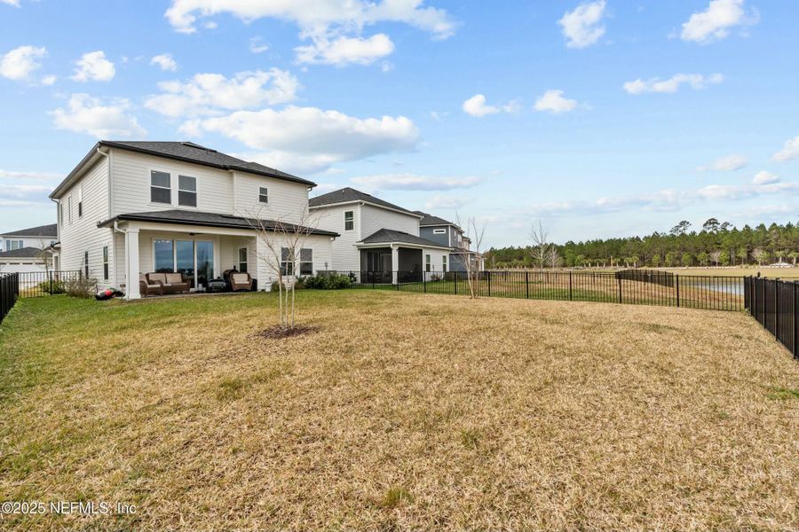 Front exterior of a new home in Silver Landing at SilverLeaf, St. Augustine, FL, highlighting curb appeal (Image 21).