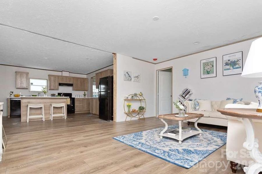 Furnished interior view inside a new home in , Newton (Image 8).