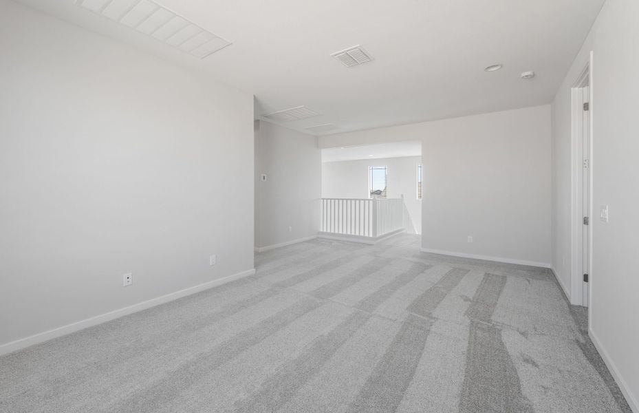 Spacious, unfurnished interior of a new home in Jorde Farms, Queen Creek (Image 17).