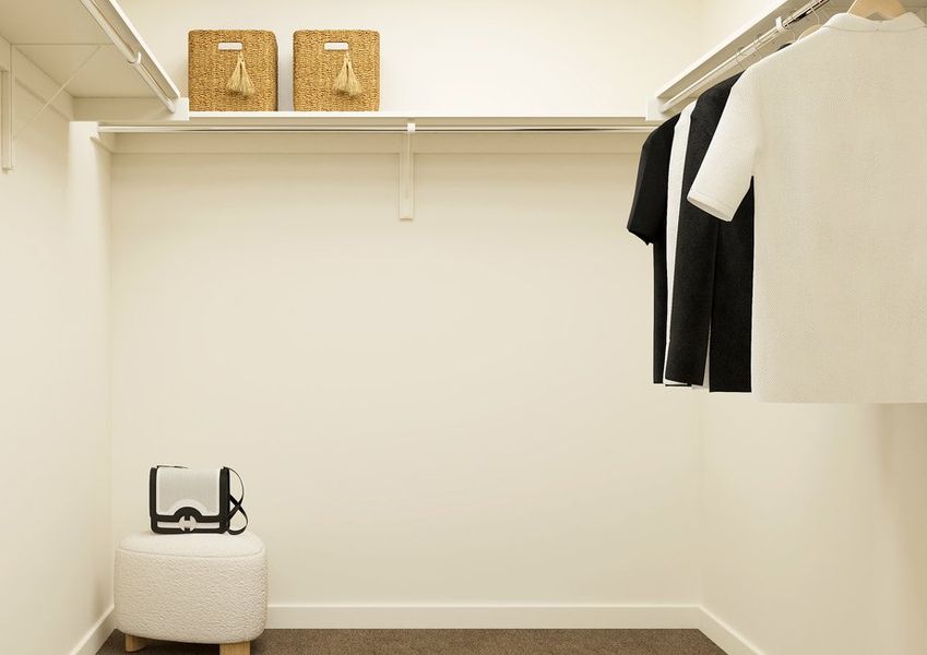 Rendering of a walk-in closet showing a small stool in the corner. Rendering of a walk-in closet showing a small stool in the corner.