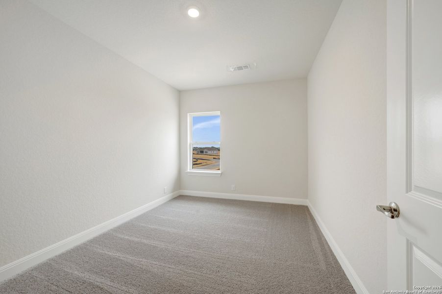 Spacious, unfurnished interior of a new home in Windsong - Reserve Series, Boerne (Image 35).