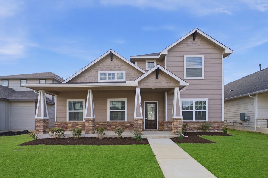 Front exterior of a new home in Brooklands, Hutto, TX, highlighting curb appeal (Image 1). Front exterior of a new home in Brooklands, Hutto, TX, highlighting curb appeal (Image 1).