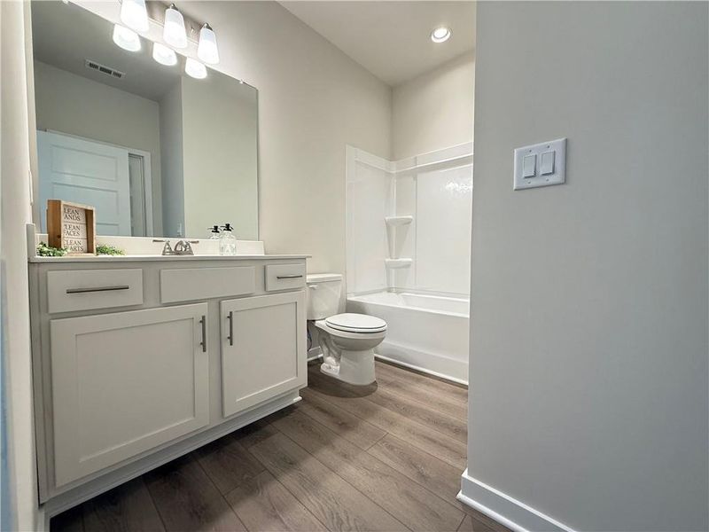 Furnished interior view inside a new home in Ponderosa Farms Manor, Gainesville (Image 13).