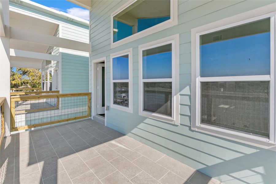 Exterior details and patio area of a home in , Matagorda (Image 17).