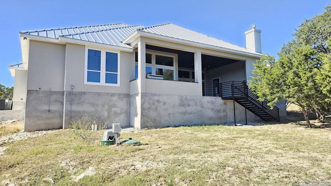 Exterior details and patio area of a home in , New Braunfels (Image 3).