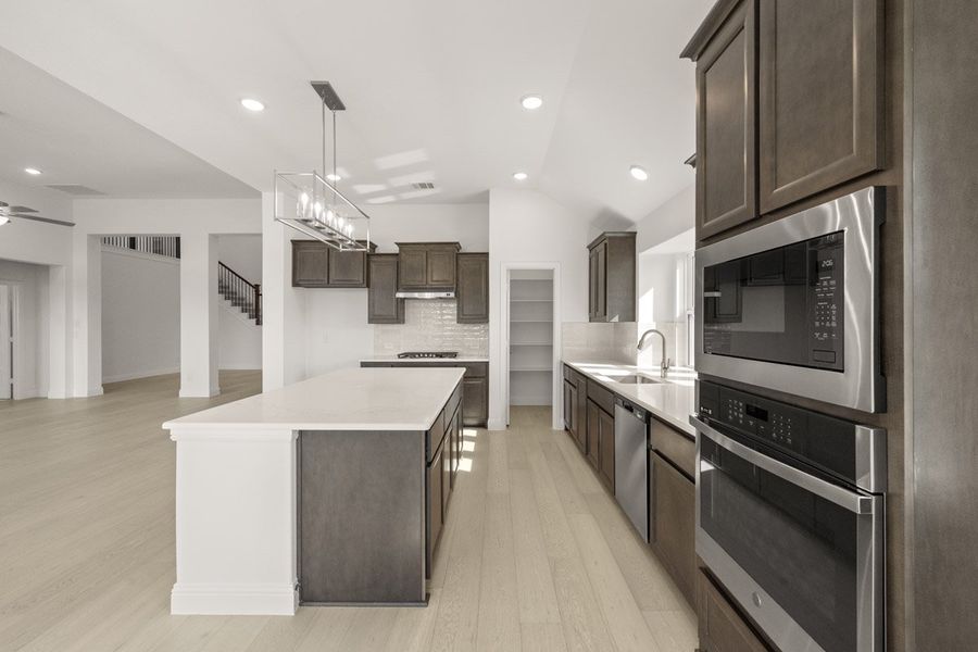 Representative furnished interior of a home built from the Sandstone II by Pacesetter Homes in Timberbrook, Justin (Image 6).
