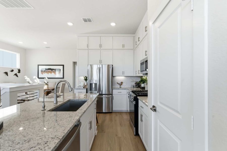 Furnished interior view inside a new home in Rose Hill, San Antonio (Image 14).