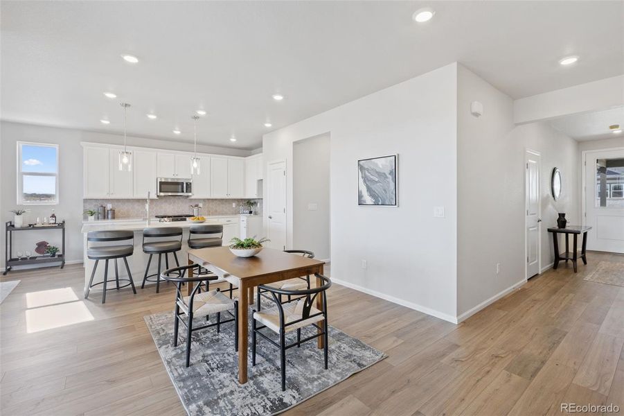 Furnished interior view inside a new home in The Legacy Collection at Talon Pointe, Thornton (Image 11).