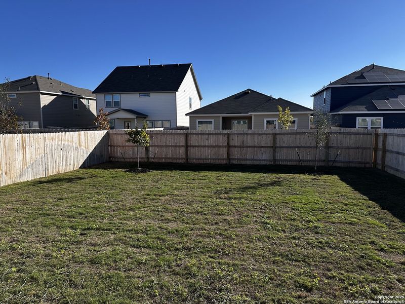 Exterior details and patio area of a home in Hennersby Hollow, San Antonio (Image 2).