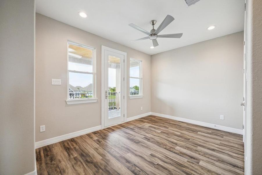 upstairs bedroom has its own balcony, step out for a beautiful view of Clear Lake.