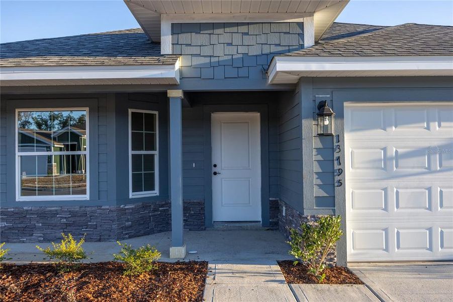 Exterior details and patio area of a home in Briarwood, Alachua (Image 26).