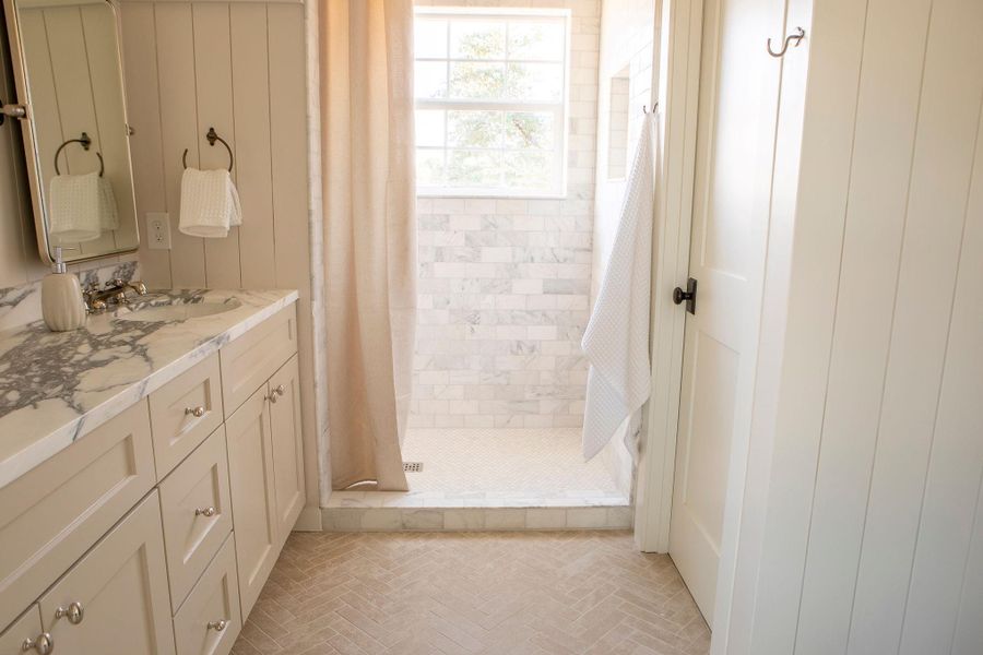 Full bath with vanity and a shower stall Full bath with vanity and a shower stall