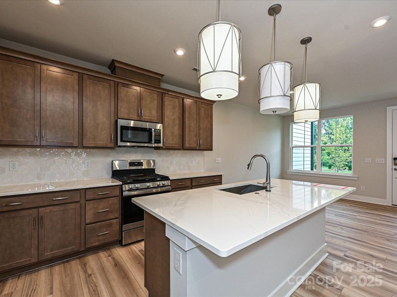 Casual dining or meal preparation at the large island.