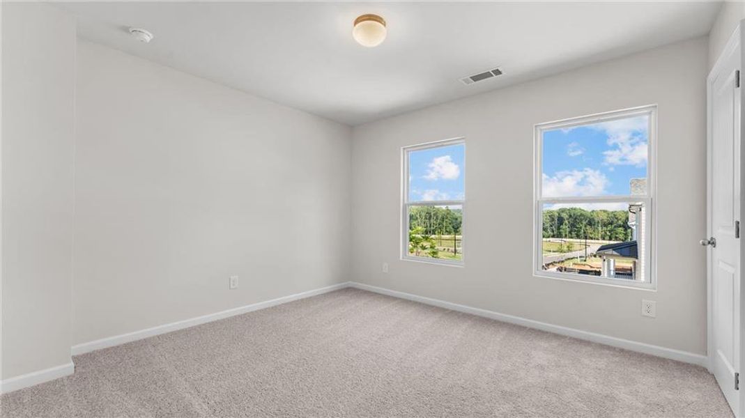 Spacious, unfurnished interior of a new home in Magnolia Trace, Flowery Branch (Image 11).