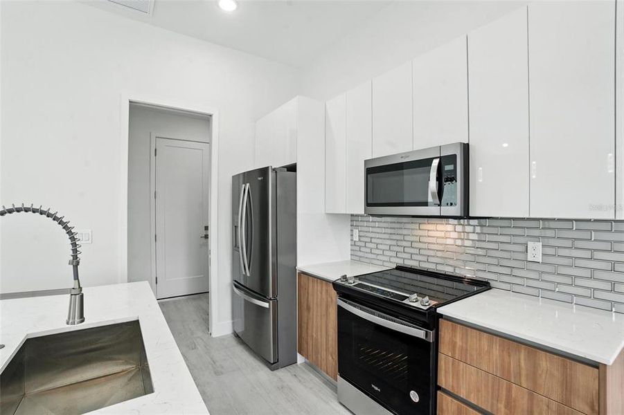 Furnished interior view inside a new home in , Port Charlotte (Image 11).