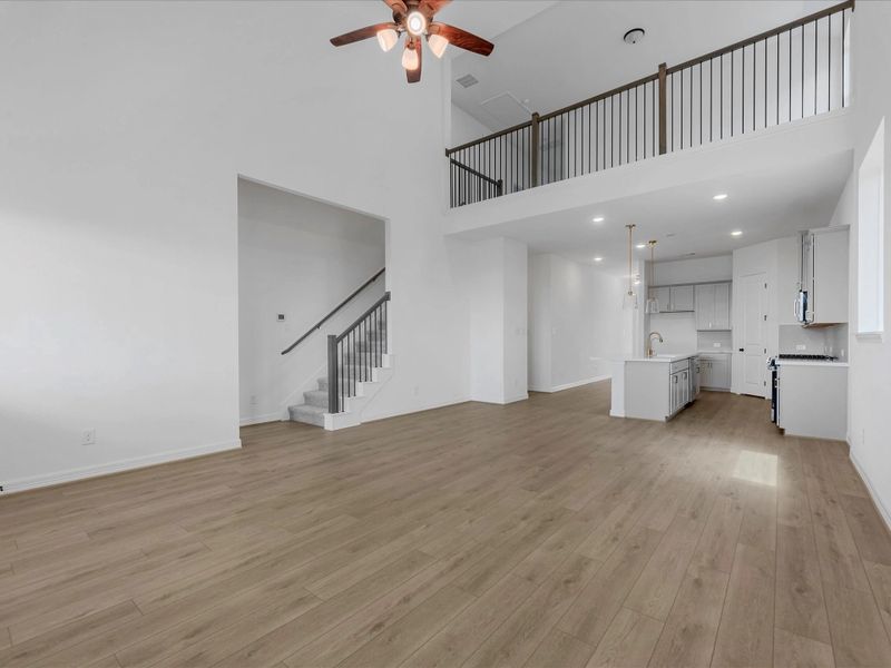 Gathering room. Sample product photo. Actual exterior and interior selections may vary by homesite. Photo may be virtually staged.
