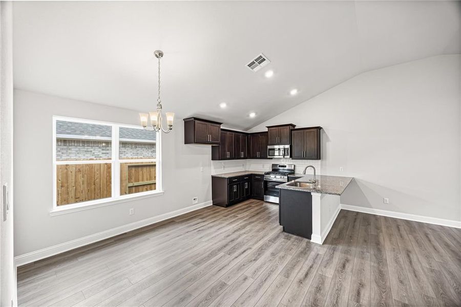 Furnished interior view inside a new home in Stonebrooke, Conroe (Image 4).