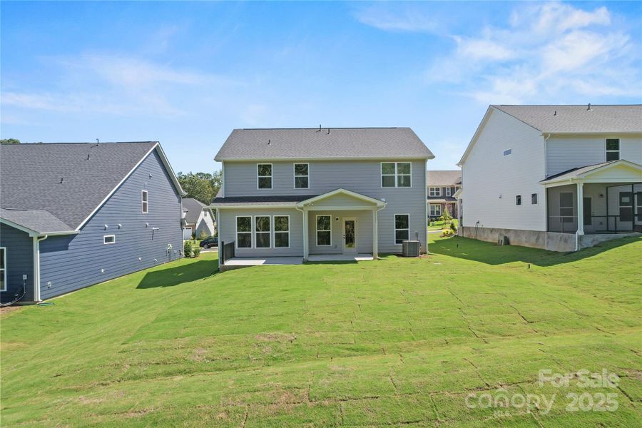 Exterior details and patio area of a home in Forest Creek, Waxhaw (Image 21).