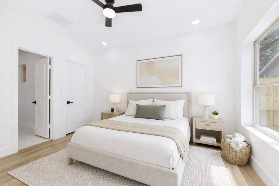 Virtually staged downstairs bedroom with full bath Virtually staged downstairs bedroom with full bath