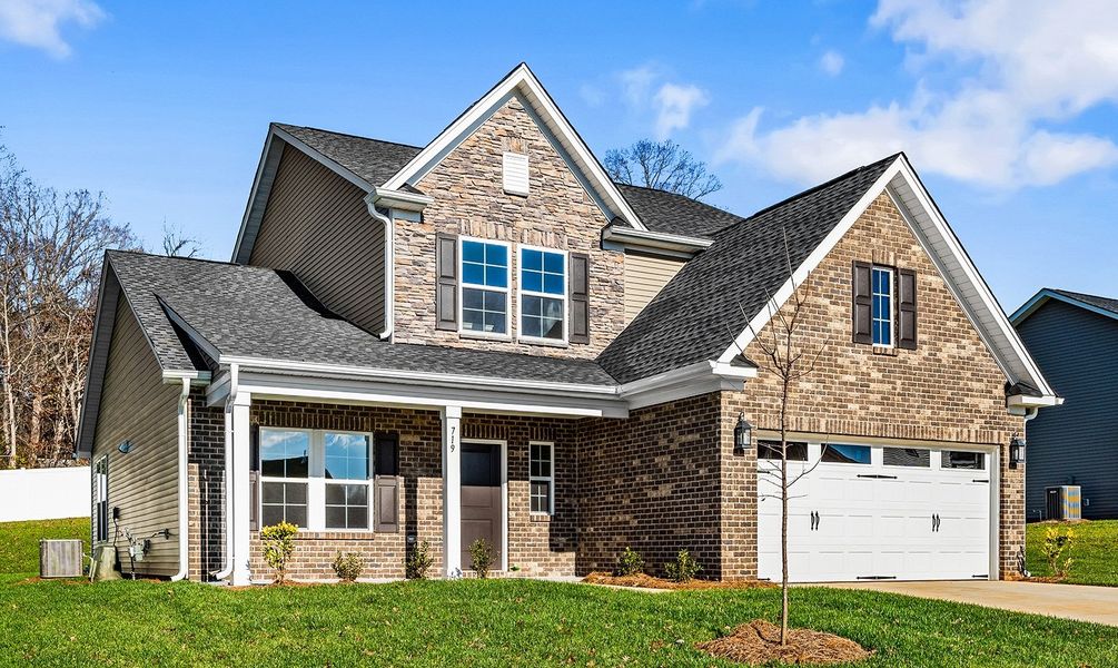 Front exterior of a new home in Hanes Lake, Winston-Salem, NC, highlighting curb appeal (Image 2).