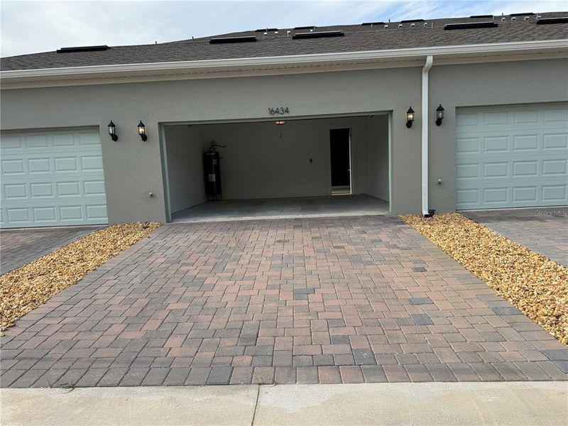 Exterior details and patio area of a home in Hamlin Ridge, Winter Garden (Image 22).