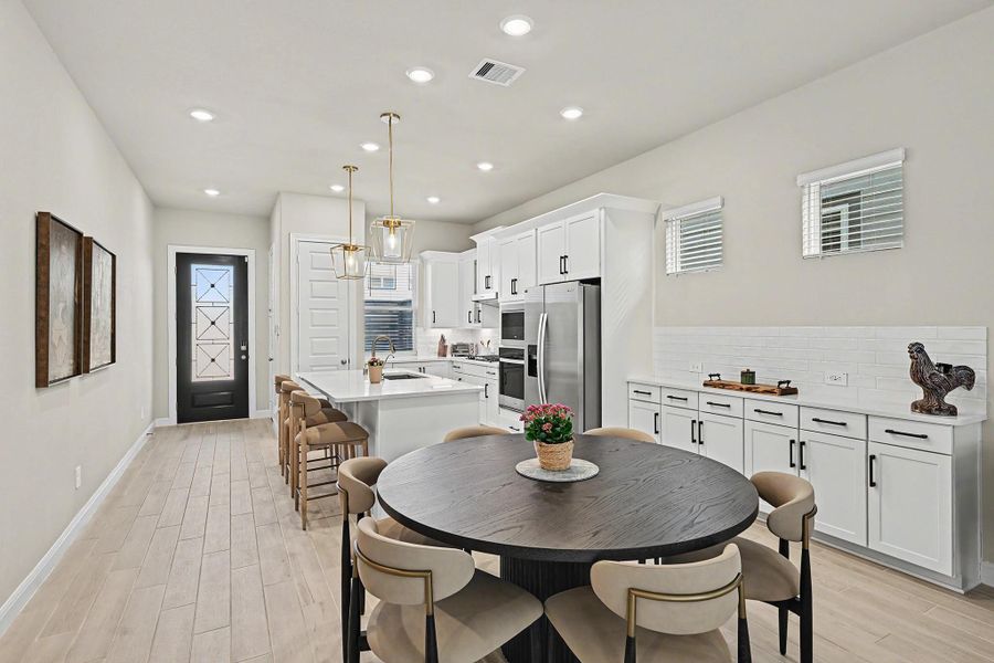 The dining area features a built-in buffet, ideal for serving and hosting. The dining area features a built-in buffet, ideal for serving and hosting.