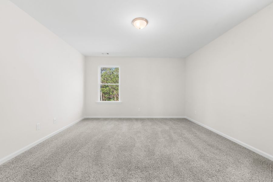 Representative unfurnished interior of a home built from the The Gwinnett by Smith Family Homes in Settlers Hammock, Kingsland (Image 31).