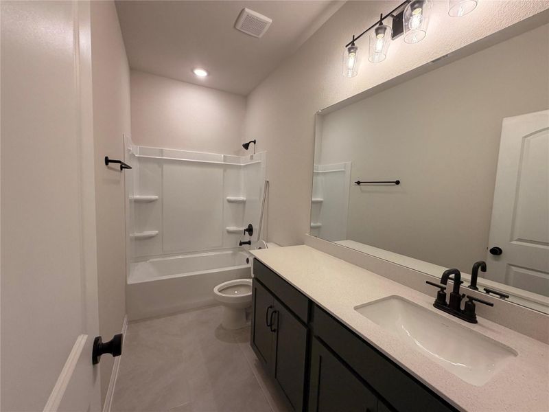 Furnished interior view inside a new home in The Colony, Bastrop (Image 4).