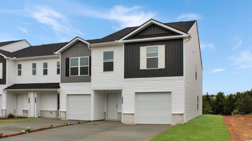 Front exterior of a new home in Owensby Farms Townhomes, Dayton, TN, highlighting curb appeal (Image 2). Front exterior of a new home in Owensby Farms Townhomes, Dayton, TN, highlighting curb appeal (Image 2).