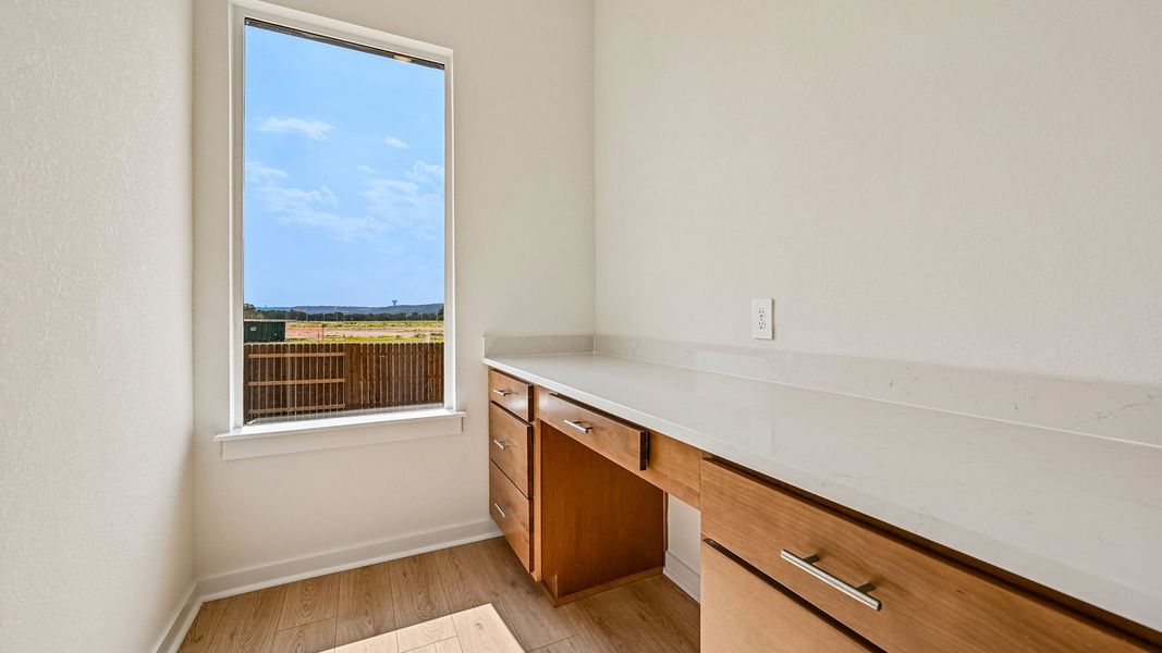 Furnished interior view inside a new home in The Enclave at Bar W Ranch, Leander (Image 16).