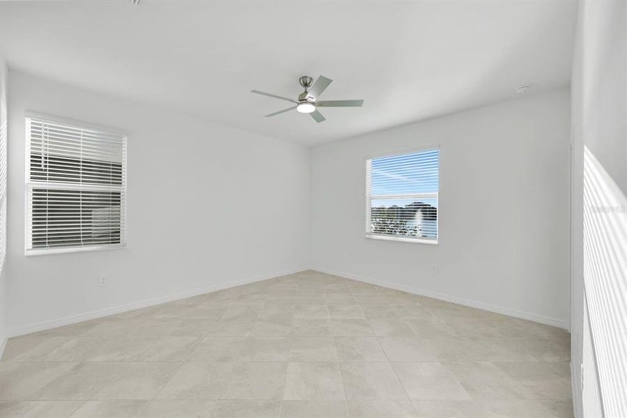 Spacious, unfurnished interior of a new home in Hampton Lakes at River Hall, Alva (Image 19).