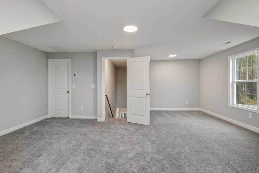 Representative unfurnished interior of a home built from the Garland by Caviness & Cates Communities in Bartlett Manor, Youngsville (Image 255). Representative unfurnished interior of a home built from the Garland by Caviness & Cates Communities in Bartlett Manor, Youngsville (Image 255).