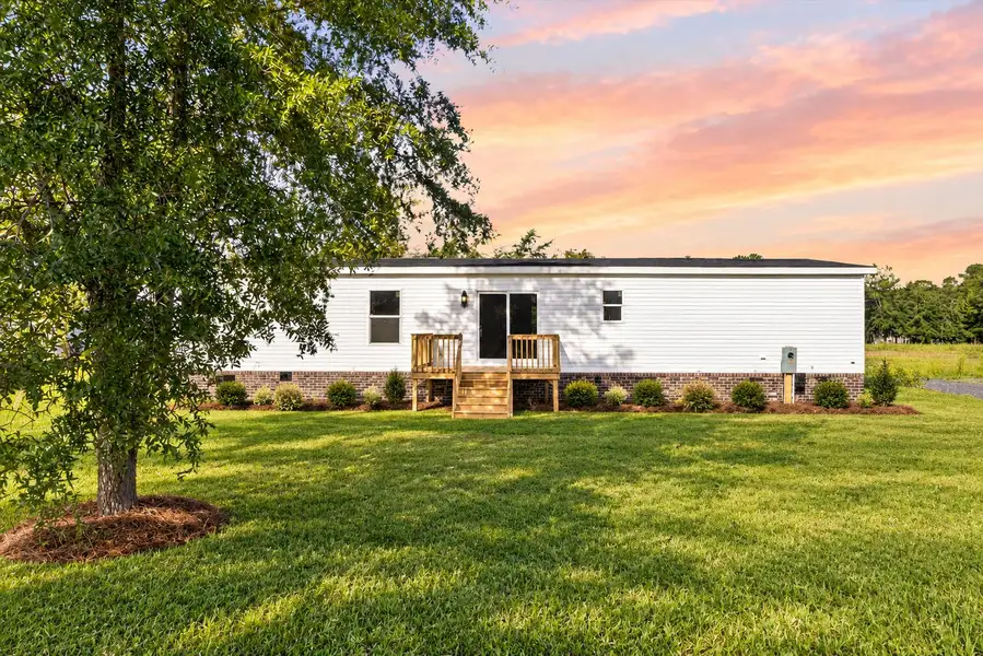 Exterior details and patio area of a home in , Cross (Image 3).