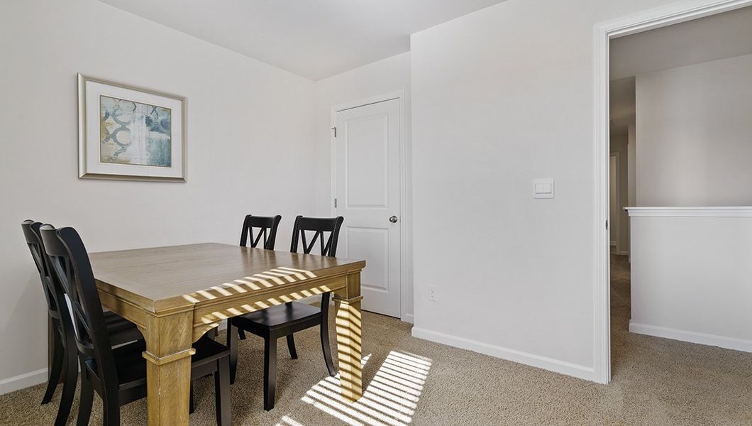 Representative furnished interior of a home built from the Penwell by D.R. Horton in Sage Grove, Lyman (Image 26).