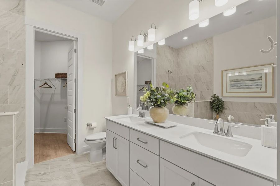 Furnished interior view inside a new home in Long Bay Golf Club, Longs (Image 15).