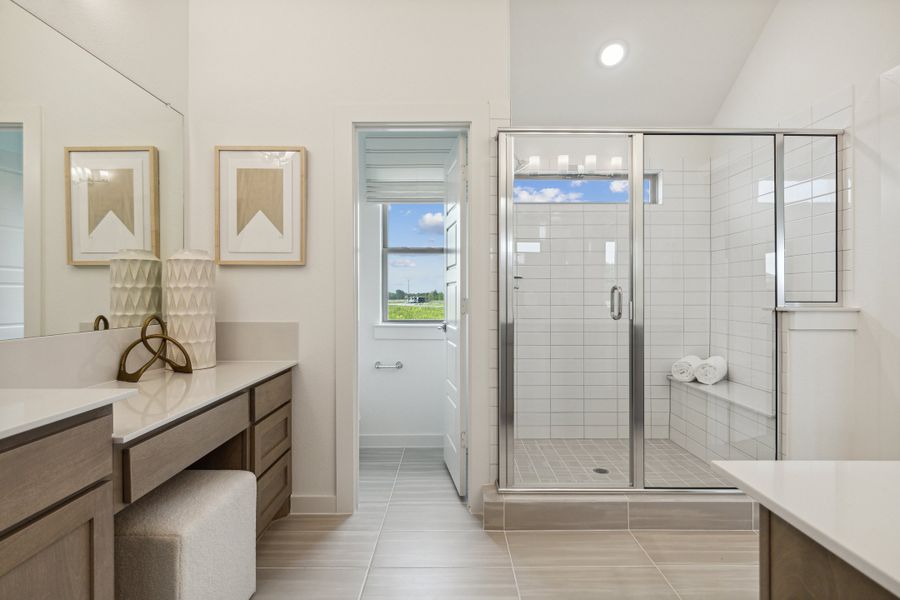 Primary Bathroom in the Gilmour home plan by Trophy Signature Homes – REPRESENTATIVE PHOTO