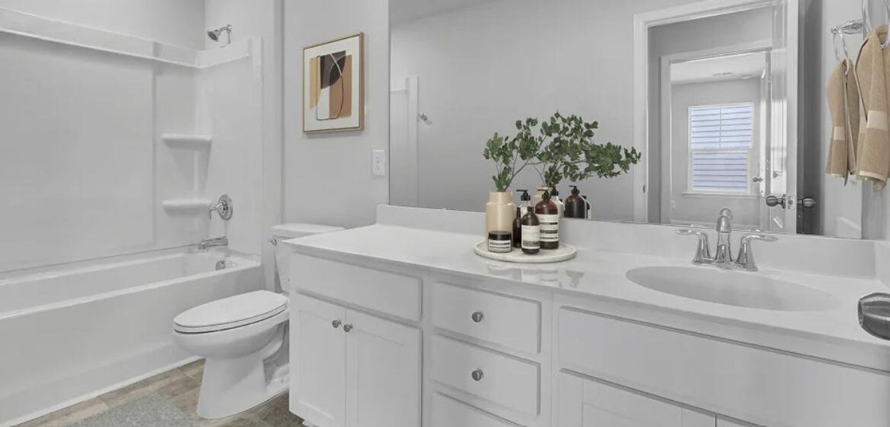 Furnished interior view inside a new home in Limehouse Farms, Summerville (Image 13). Furnished interior view inside a new home in Limehouse Farms, Summerville (Image 13).