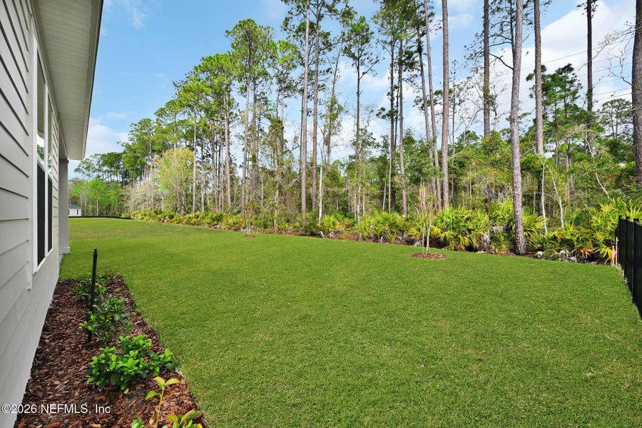 Exterior details and patio area of a home in Amelia National Country Club, Fernandina Beach (Image 3).