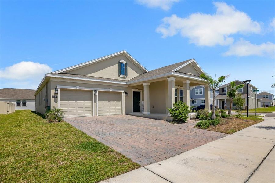 Front exterior of a new home in Tohoqua, Kissimmee, FL, highlighting curb appeal (Image 23). Front exterior of a new home in Tohoqua, Kissimmee, FL, highlighting curb appeal (Image 23).